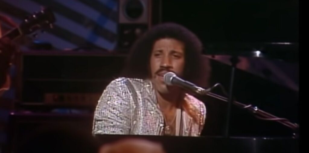 Lionel Richie singing "Three Times a Lady"