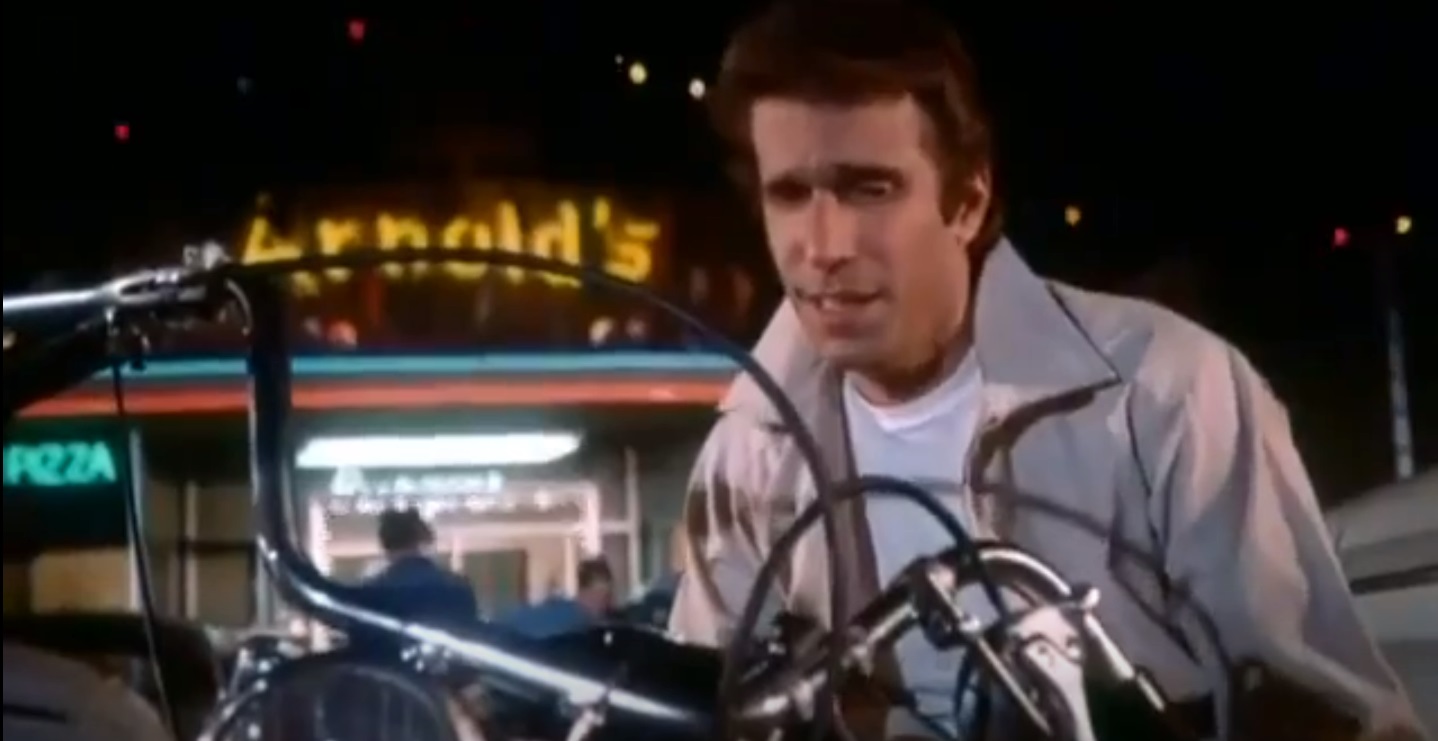 Fonzie is trying to get his bike to start