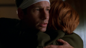 Mulder hugs Scully