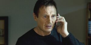 Liam Neeson makes a phone call in Taken