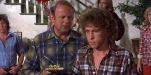 Tommy opens a Christmas present on Eight is Enough