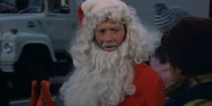 Belker dresses as Santa Claus