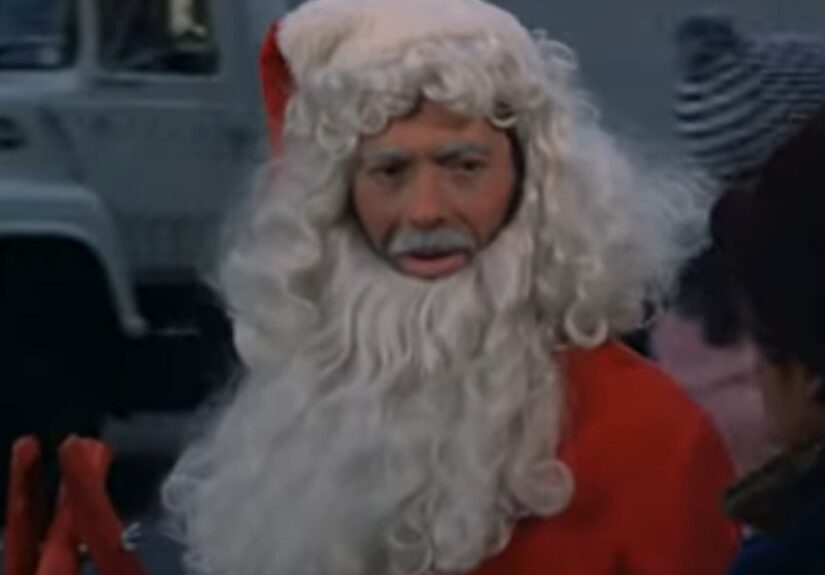 Belker dresses as Santa Claus