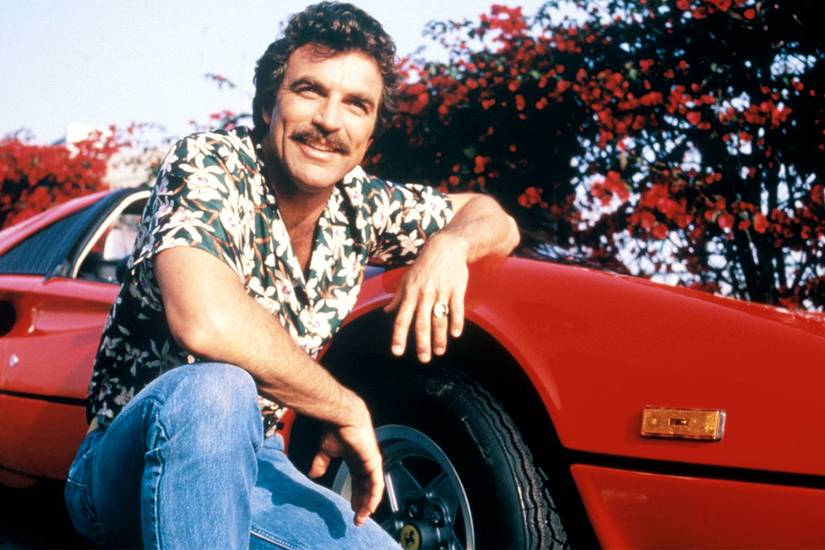 Magnum by his car