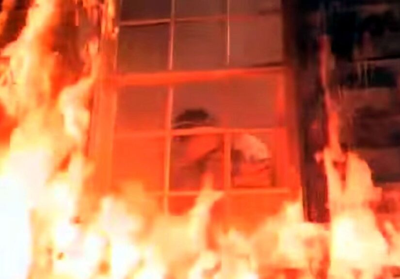 Garvey breaks the window